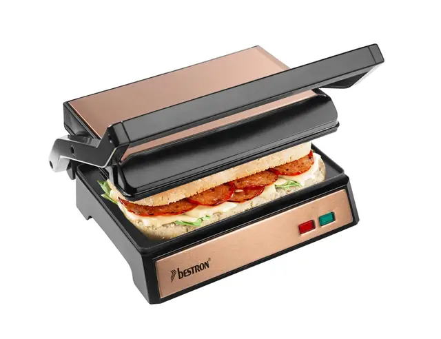 Bestron Parrilla de contacto eléctrica con sumidero, sándwichera con asa fría al tacto y apertura de 180°, revestimiento antiadherente, colección de cobre, color cobre